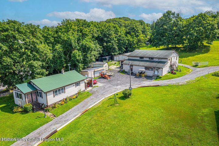 104 Lord Avenue Troy, NY 12180 - Photo 8 of 10 an aerial view of a house with swimming pool garden and patio