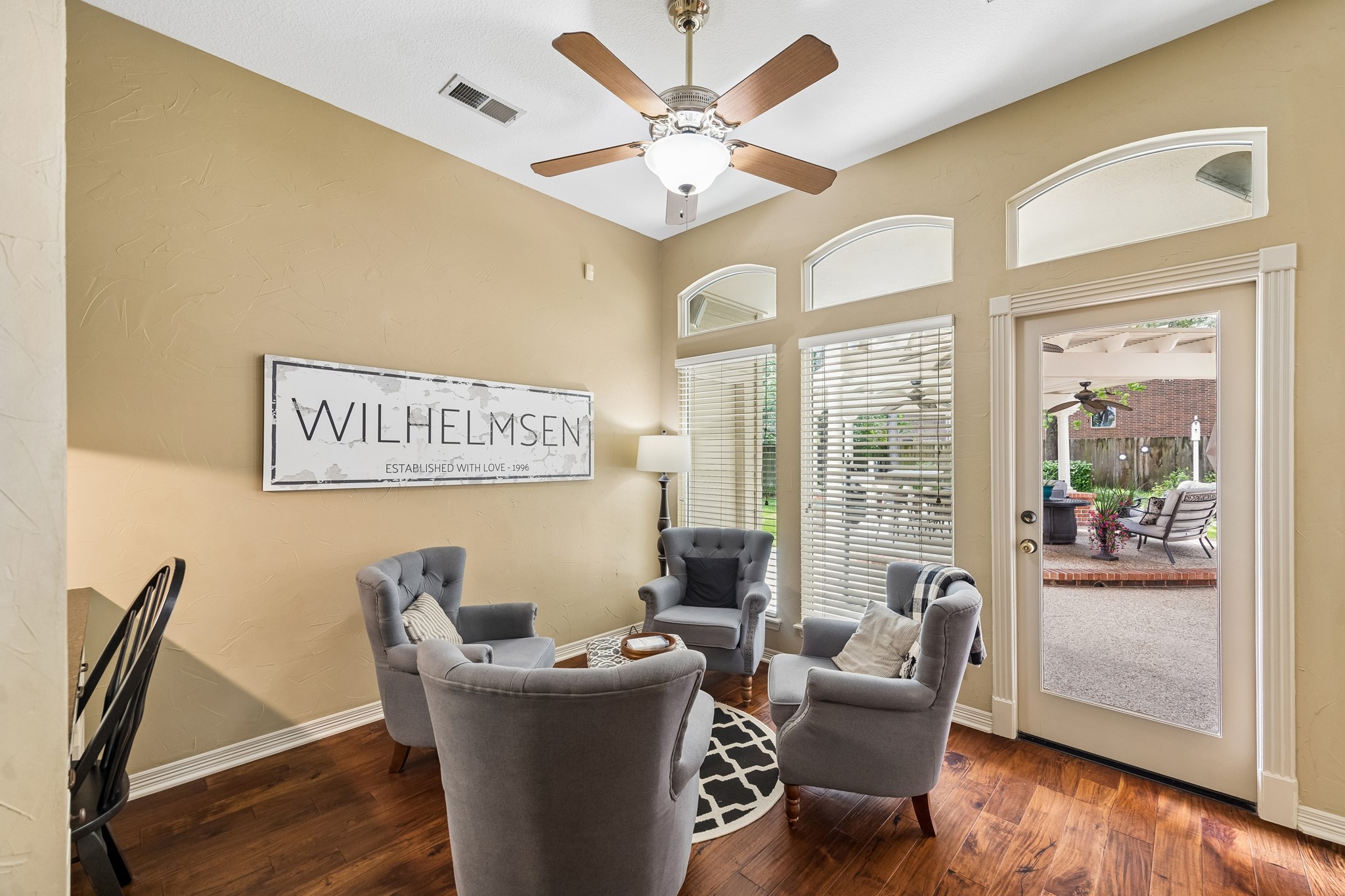 5918 Center Ct Drive Spring, TX 77379 - Photo 13 of 32 a living room with furniture and wooden floor