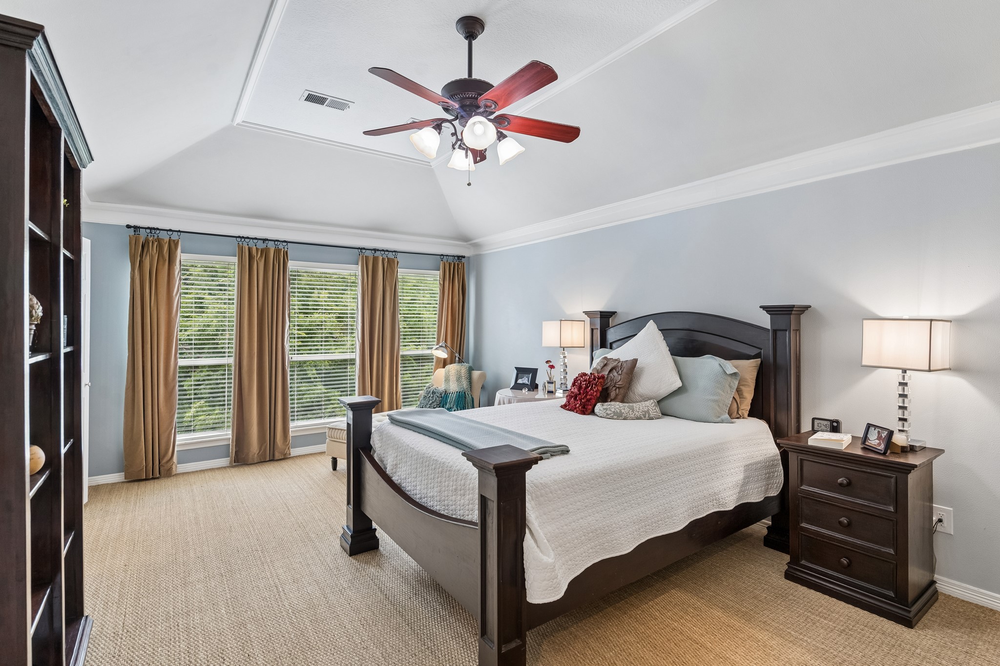 5918 Center Ct Drive Spring, TX 77379 - Photo 14 of 32 a bedroom with a bed and a chandelier