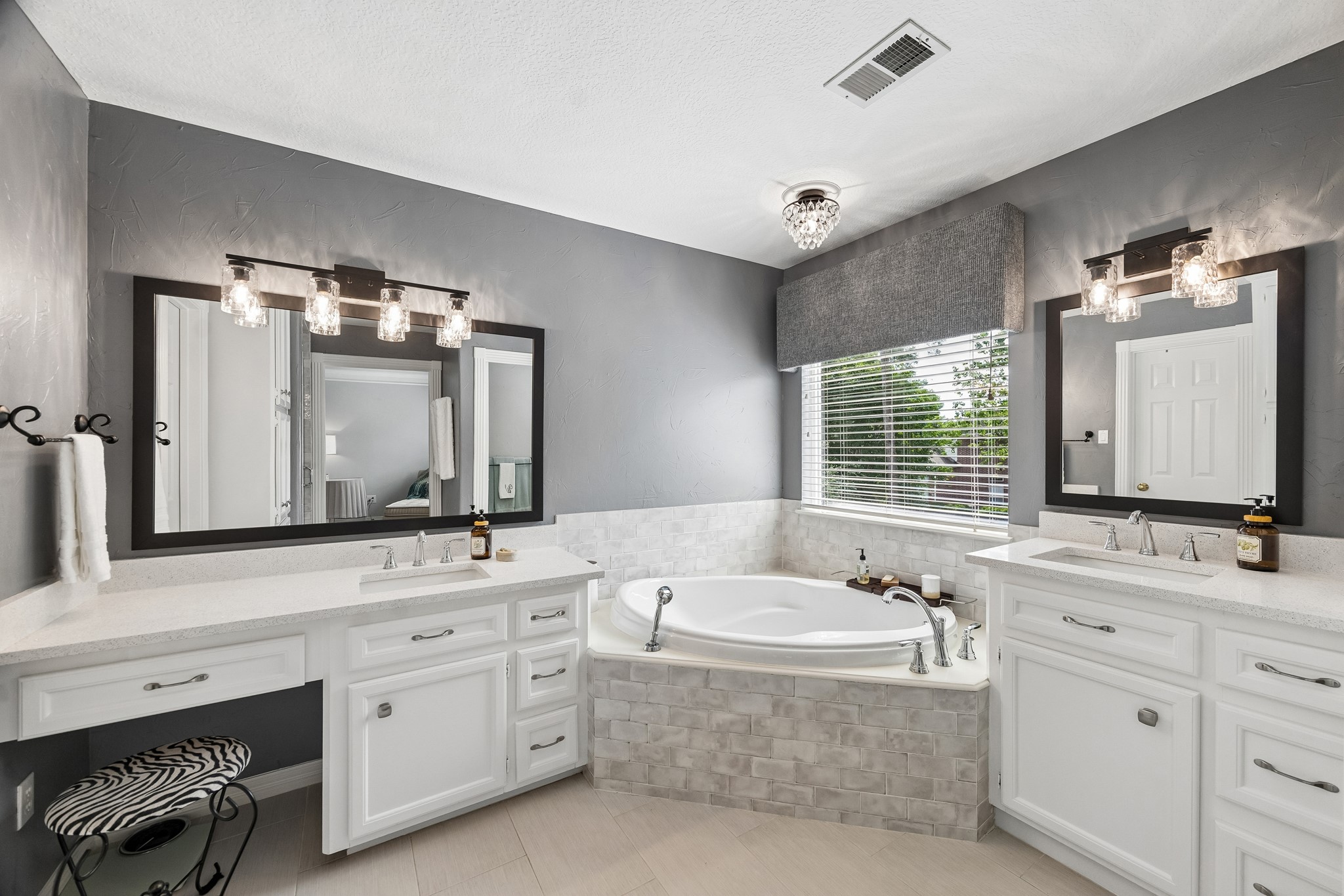 5918 Center Ct Drive Spring, TX 77379 - Photo 16 of 32 a bathroom with a double vanity sink mirror and bathtub