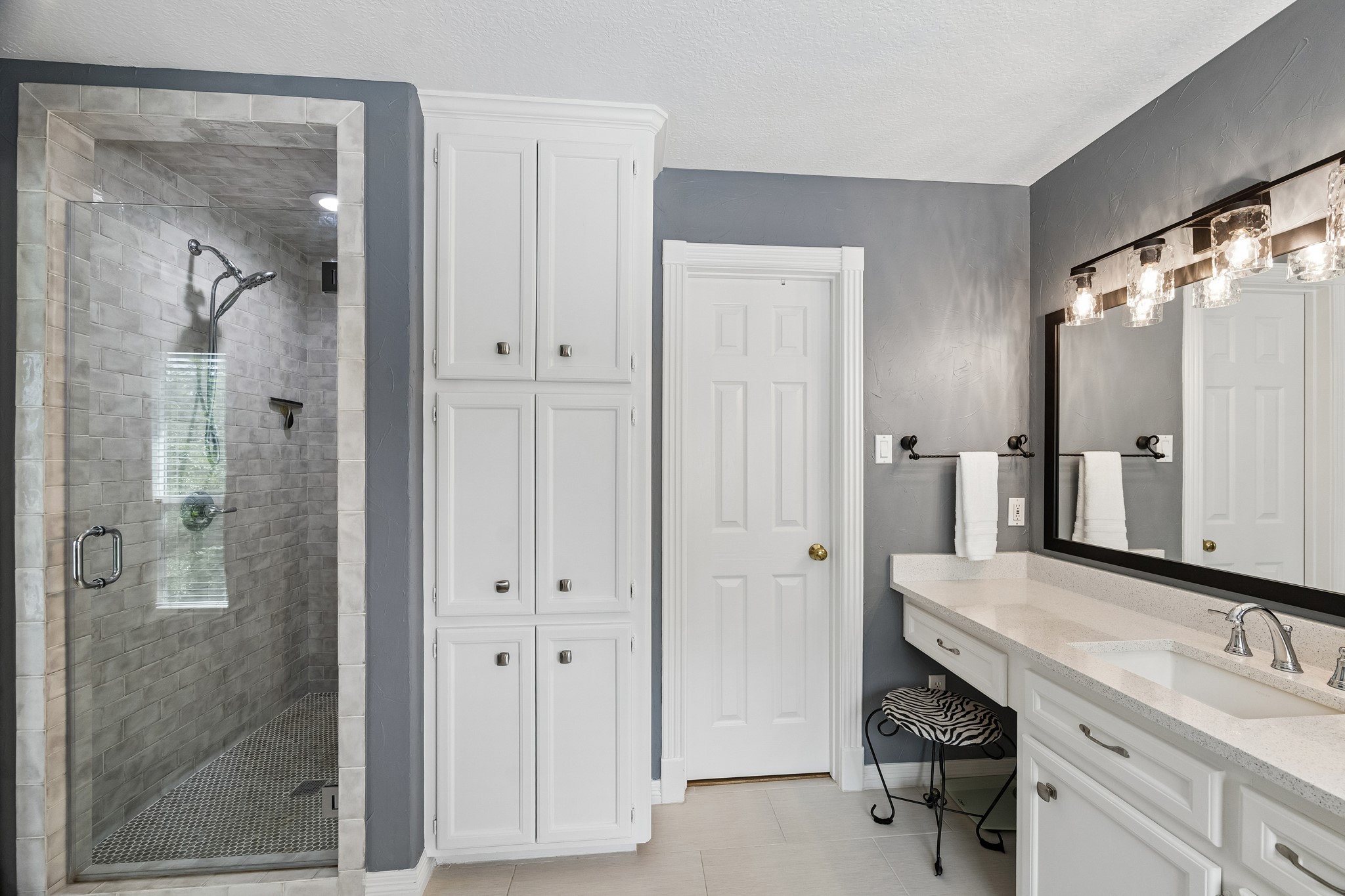 5918 Center Ct Drive Spring, TX 77379 - Photo 17 of 32 a bathroom with a shower sink and mirror