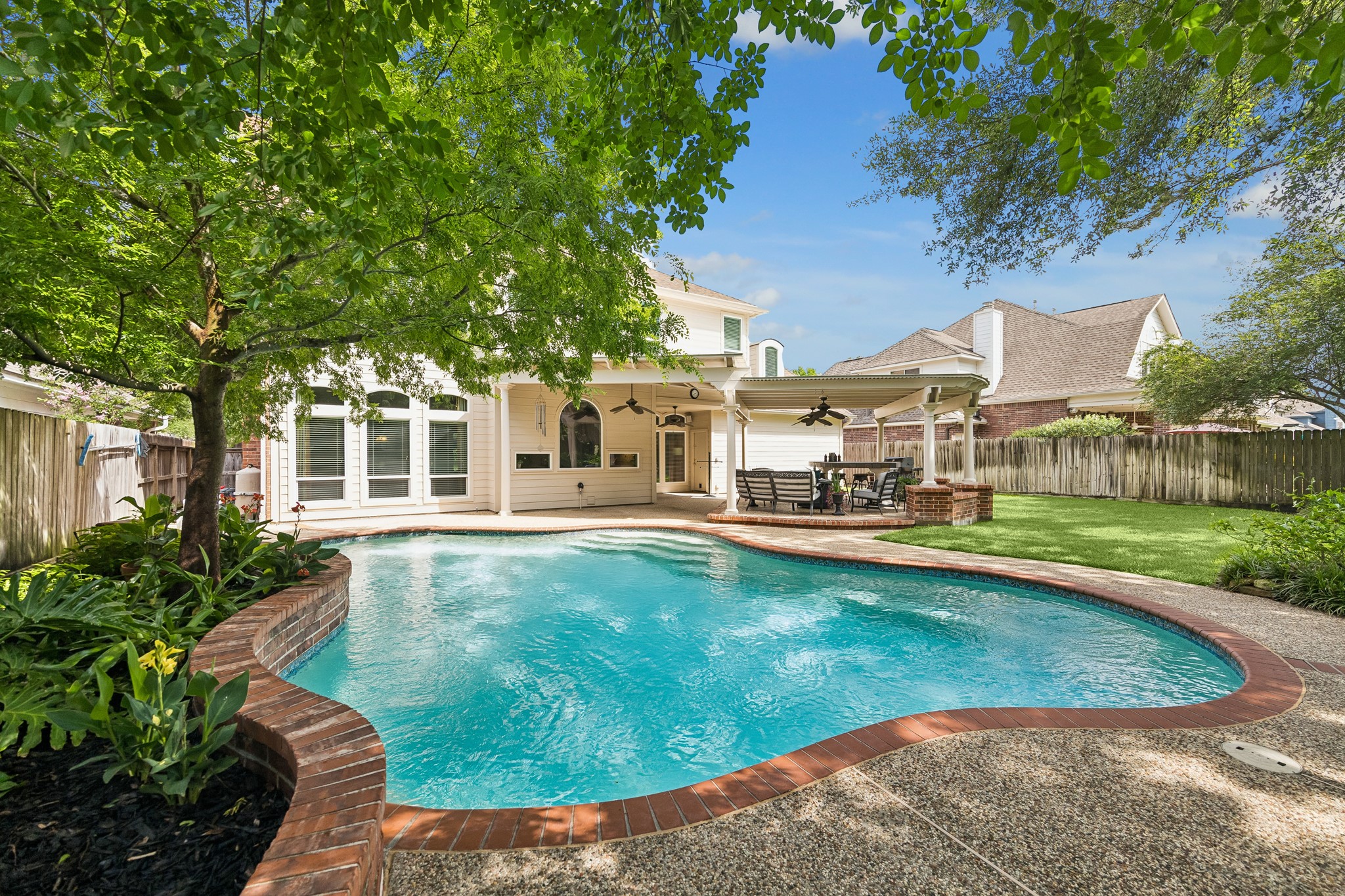5918 Center Ct Drive Spring, TX 77379 - Photo 2 of 32 a view of a house with swimming pool