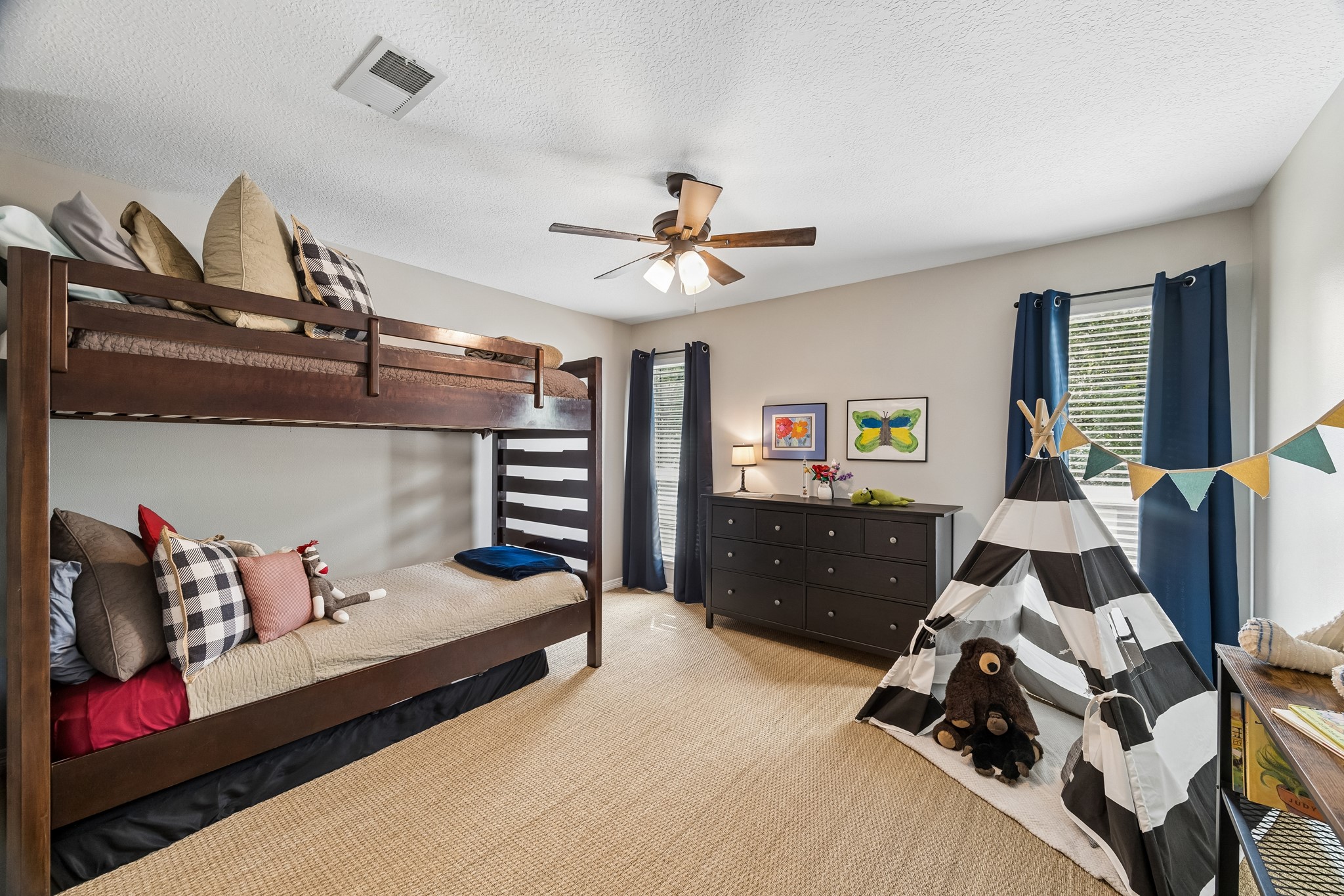 5918 Center Ct Drive Spring, TX 77379 - Photo 21 of 32 a bedroom with furniture and a chandelier