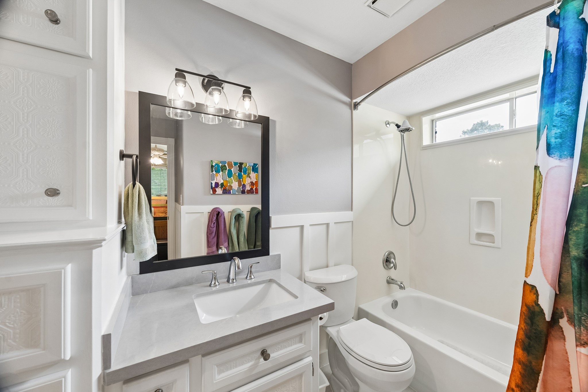 5918 Center Ct Drive Spring, TX 77379 - Photo 24 of 32 a bathroom with a sink a toilet and a mirror