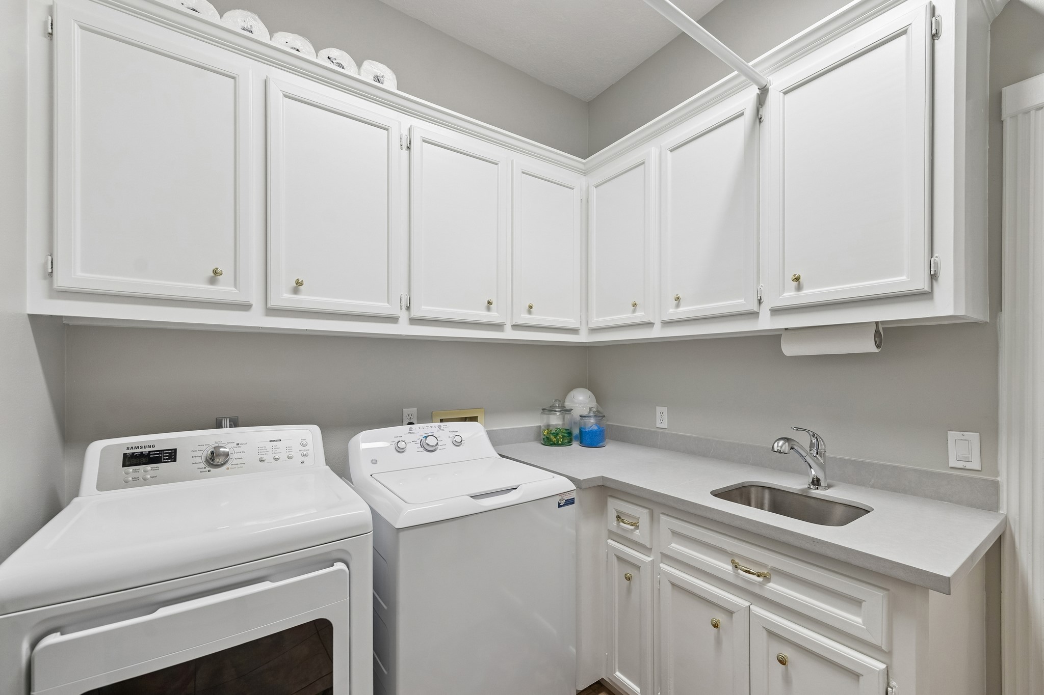 5918 Center Ct Drive Spring, TX 77379 - Photo 28 of 32 a view of storage and utility room with washer and dryer