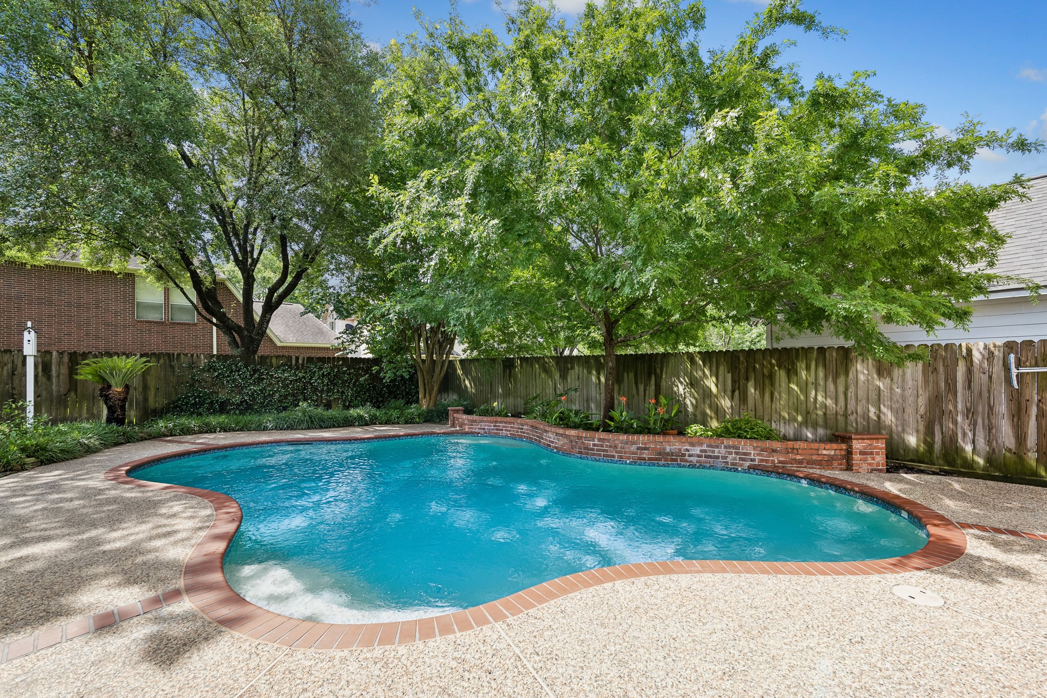 5918 Center Ct Drive Spring, TX 77379 - Photo 31 of 32 a view of a swimming pool with a backyard