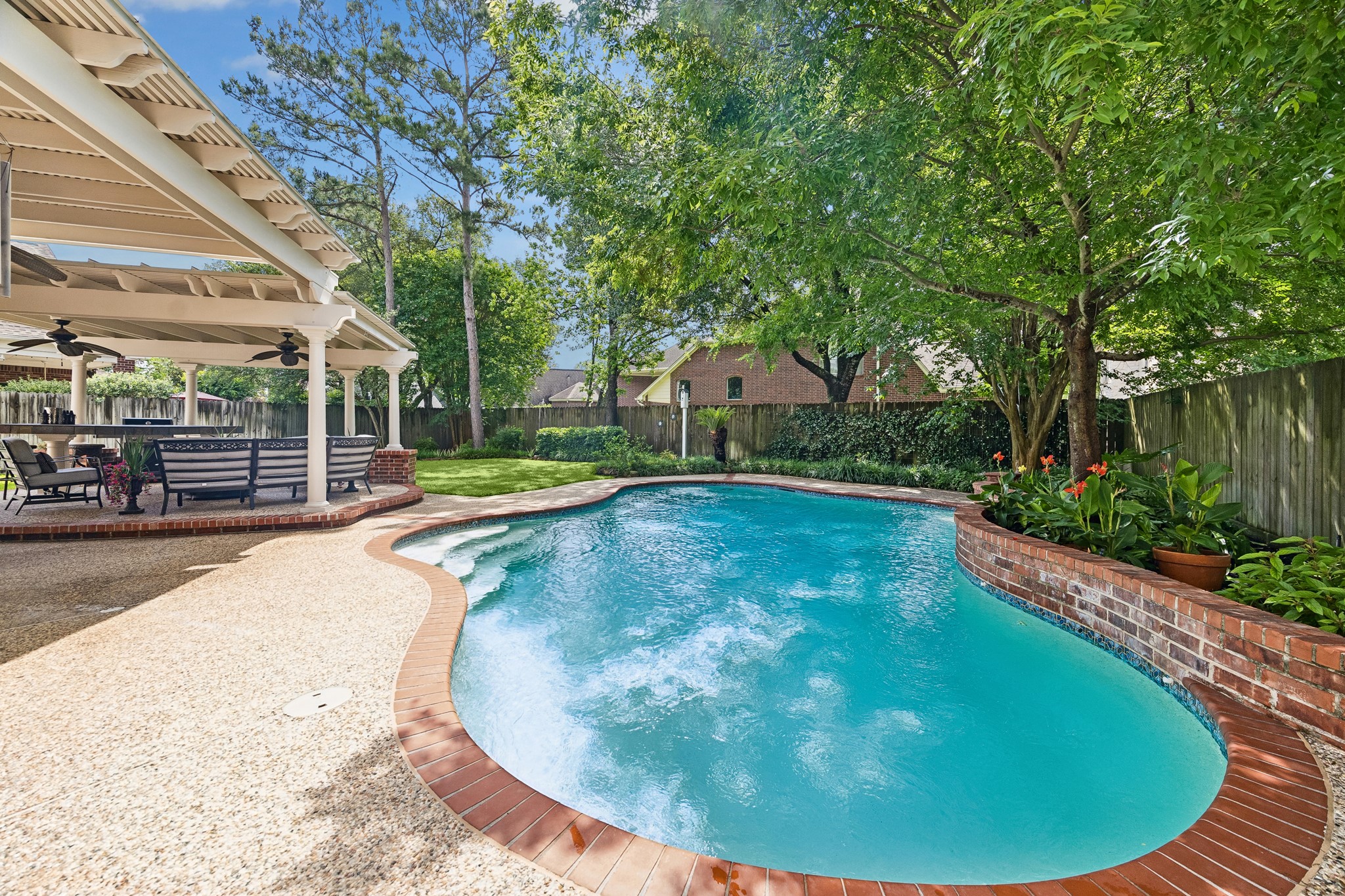 5918 Center Ct Drive Spring, TX 77379 - Photo 32 of 32 a view of a swimming pool with a patio
