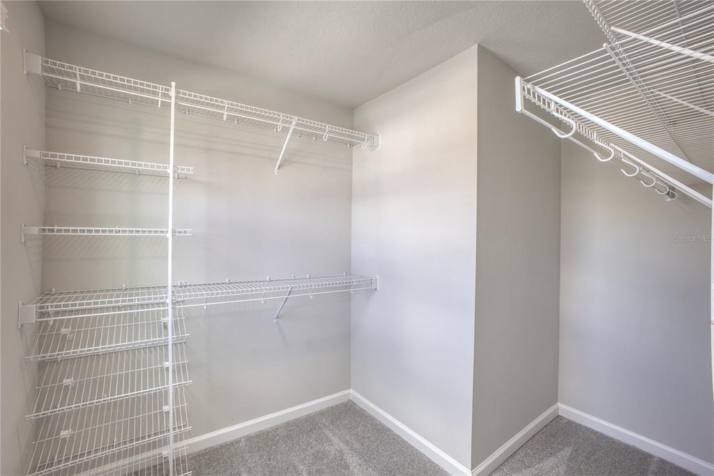 4188 Campsite Loop Orlando, FL 32824 - Photo 18 of 38 a view of a room with racks on the wall