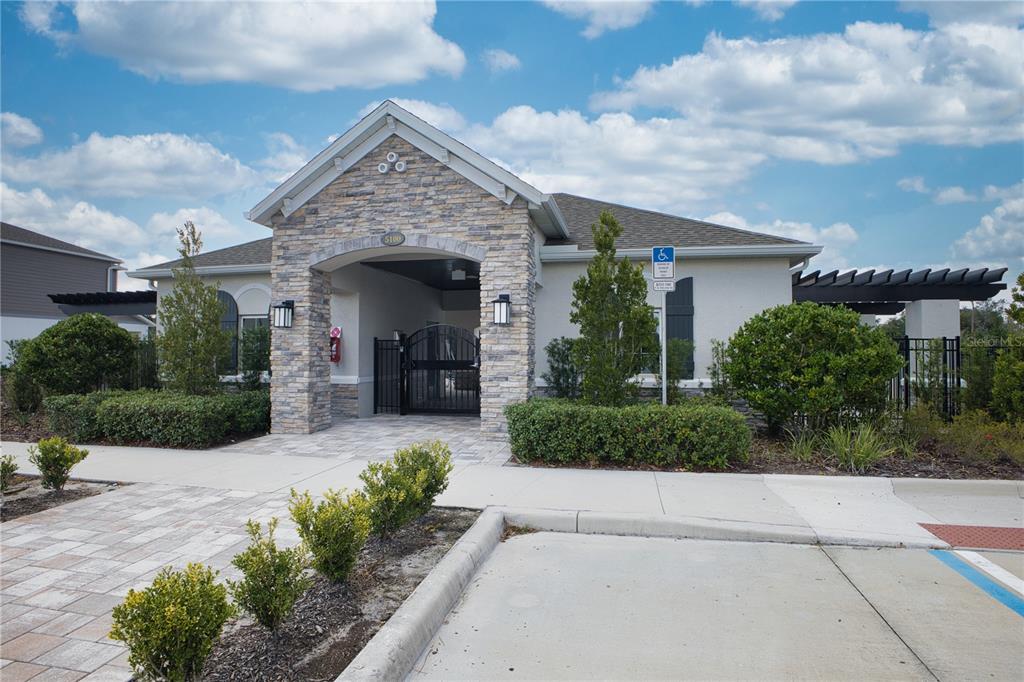 4188 Campsite Loop Orlando, FL 32824 - Photo 34 of 38 a front view of a house with a yard