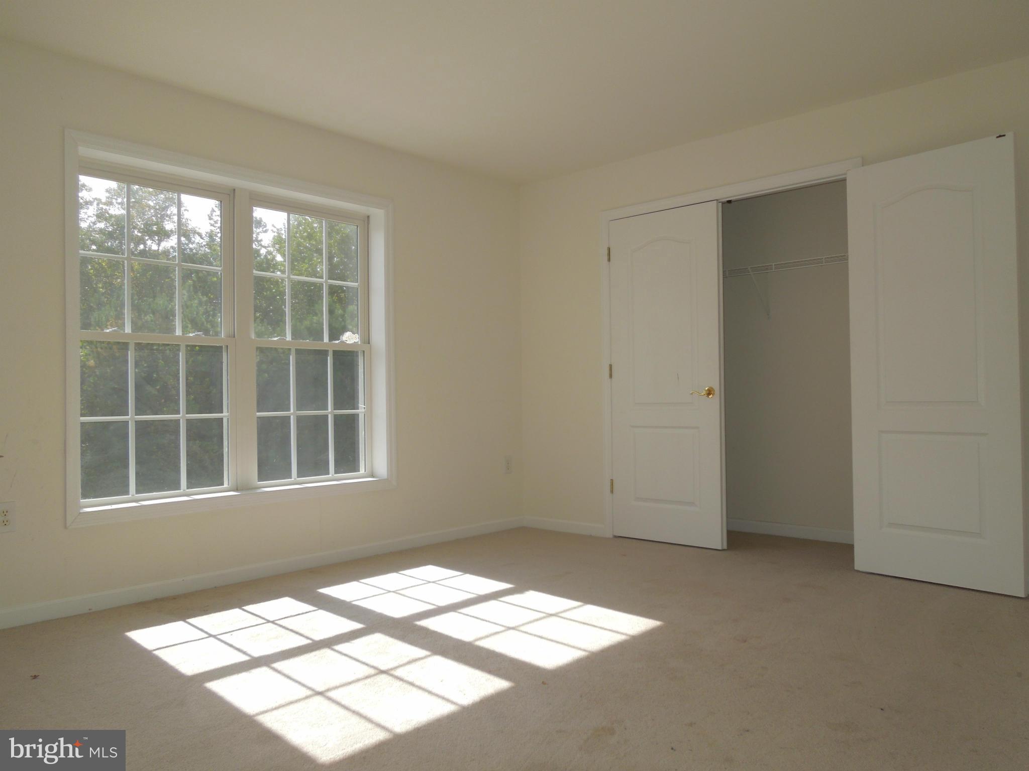 7465 Harmony Road Preston, MD 21655 - Photo 21 of 30 a view of an empty room with a window