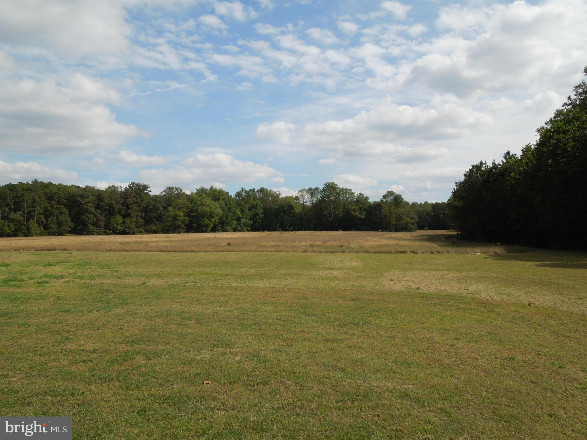 7465 Harmony Road Preston, MD 21655 - Photo 30 of 30 a view of an ocean and beach