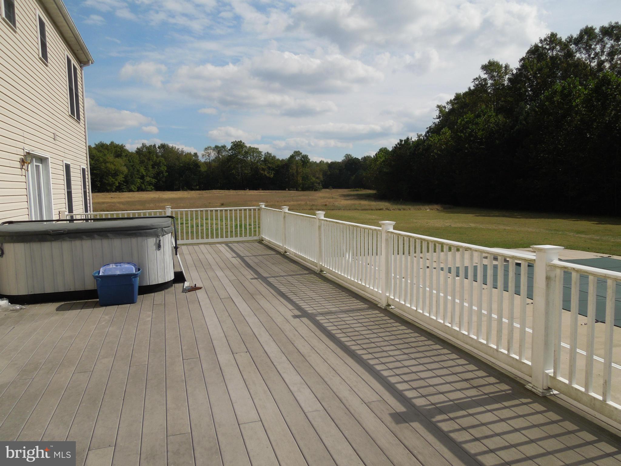 7465 Harmony Road Preston, MD 21655 - Photo 6 of 30 a view of balcony with furniture