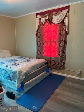 a bedroom with a bed and a bed