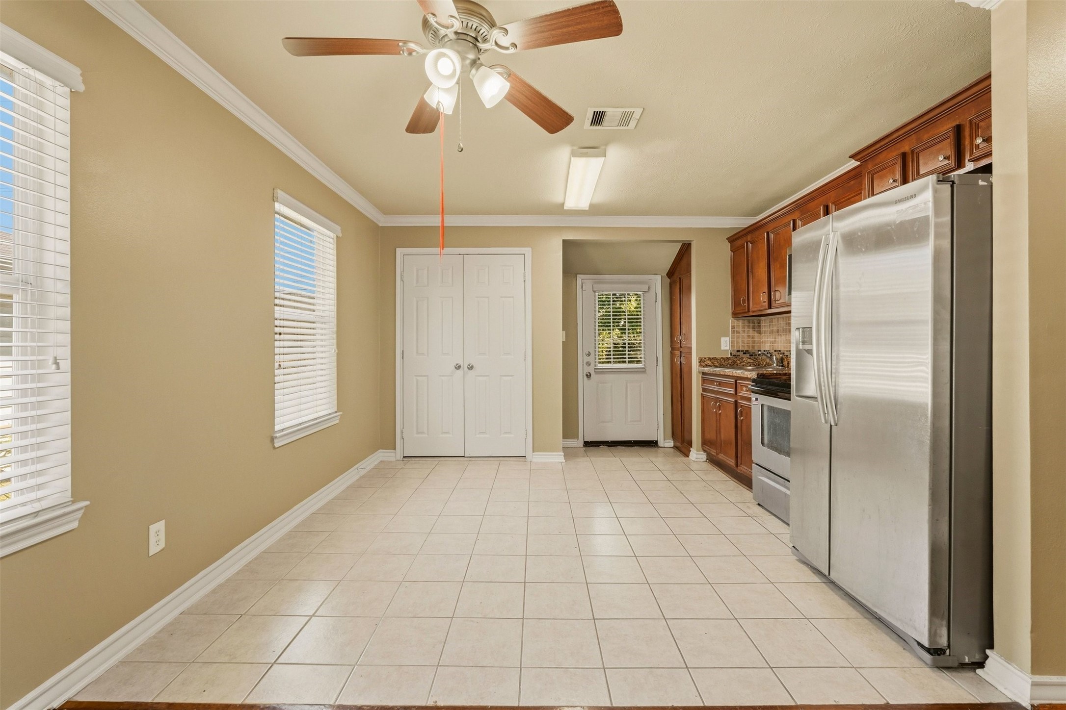 3445 Nathaniel Brown Street Houston, TX 77021 - Photo 8 of 19 a kitchen with stainless steel appliances a refrigerator and a sink