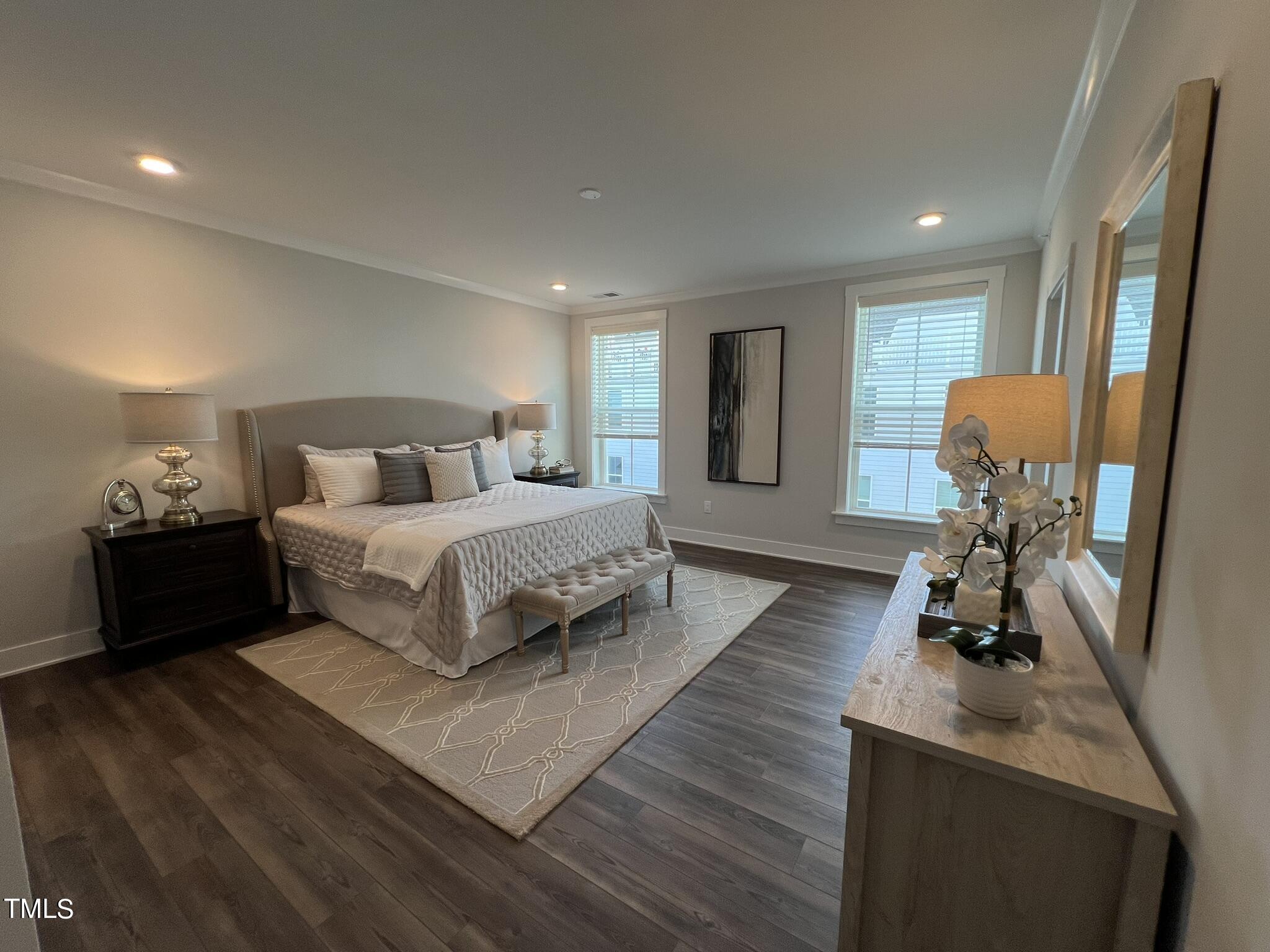 11549 Helmond Way, Unit 102 Raleigh, NC 27617 - Photo 24 of 52 Primary Bedroom