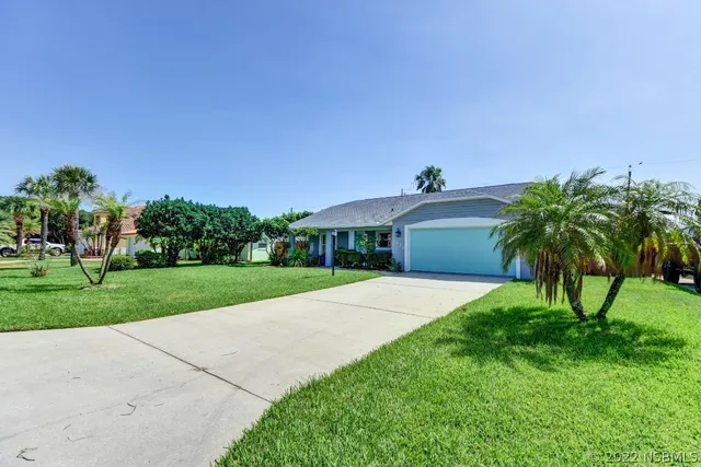 an aerial view of a house with garden