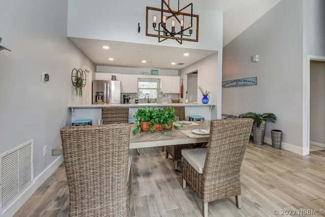 a kitchen with cabinets a sink and appliances