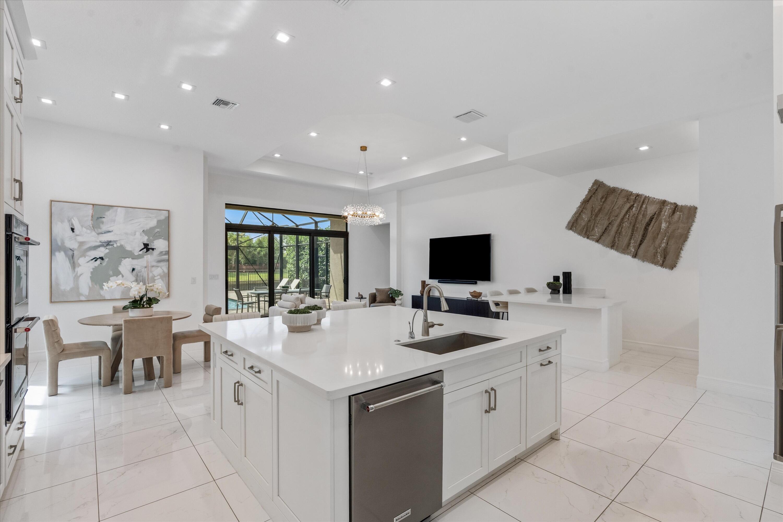 9086 Fiano Place Boca Raton, FL 33496 - Photo 11 of 62 Kitchen To Living