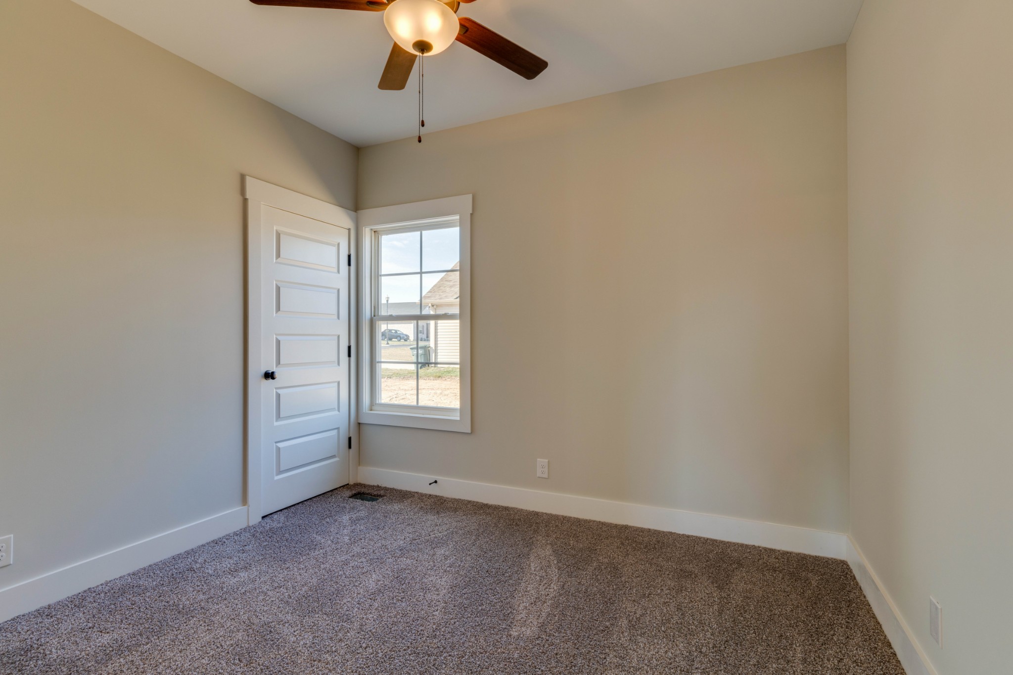 155 Julia Ann Court Springfield, TN 37172 - Photo 11 of 17 an empty room with a window and a ceiling fan