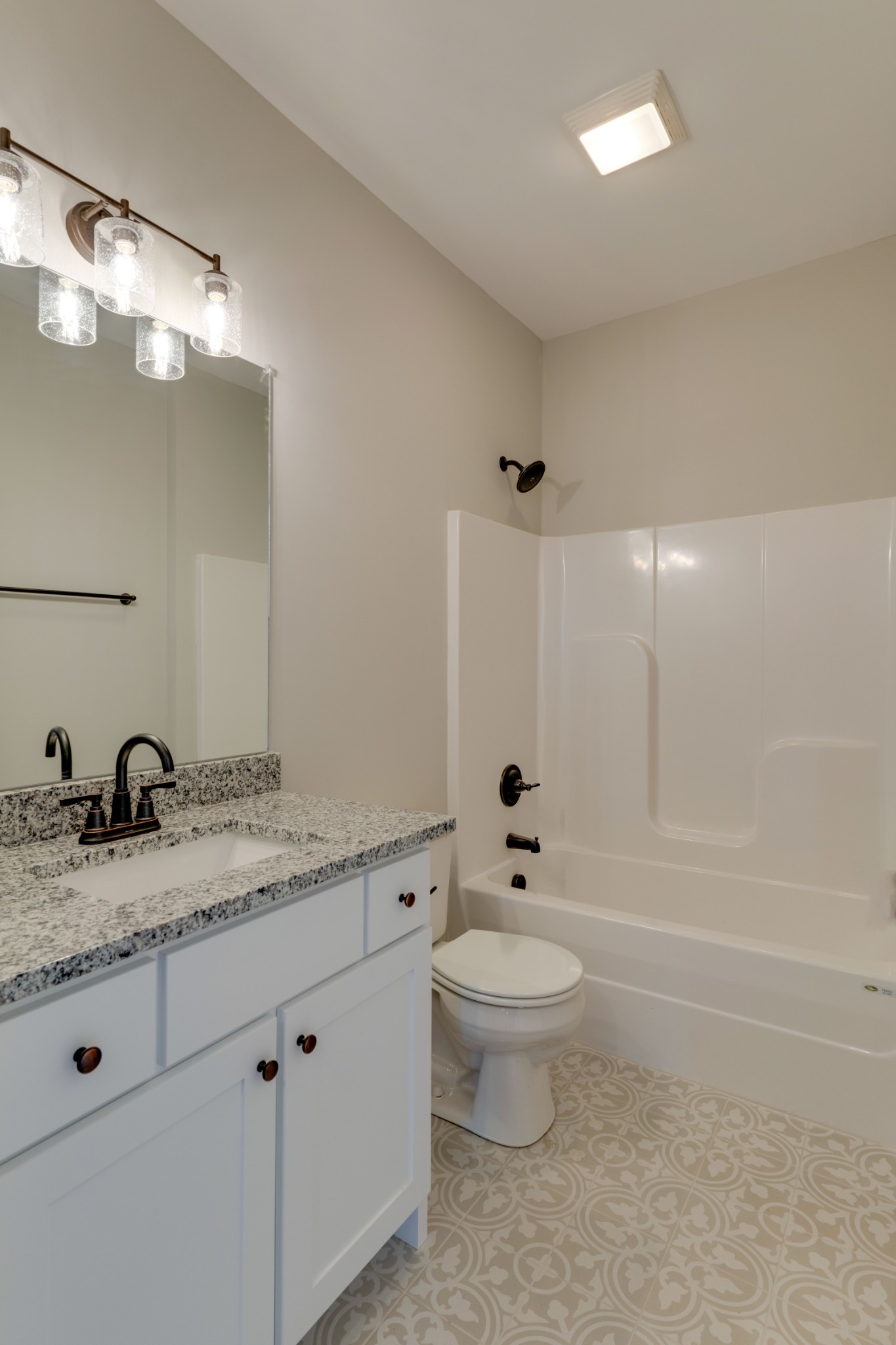 155 Julia Ann Court Springfield, TN 37172 - Photo 13 of 17 a bathroom with a granite countertop sink a toilet and bathtub