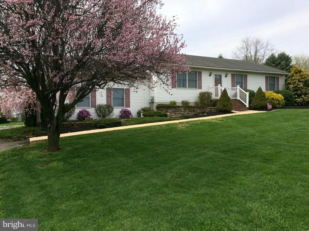 37 Surrey Lane Rising Sun, MD 21911 - Photo 1 of 30 a front view of house with yard and green space