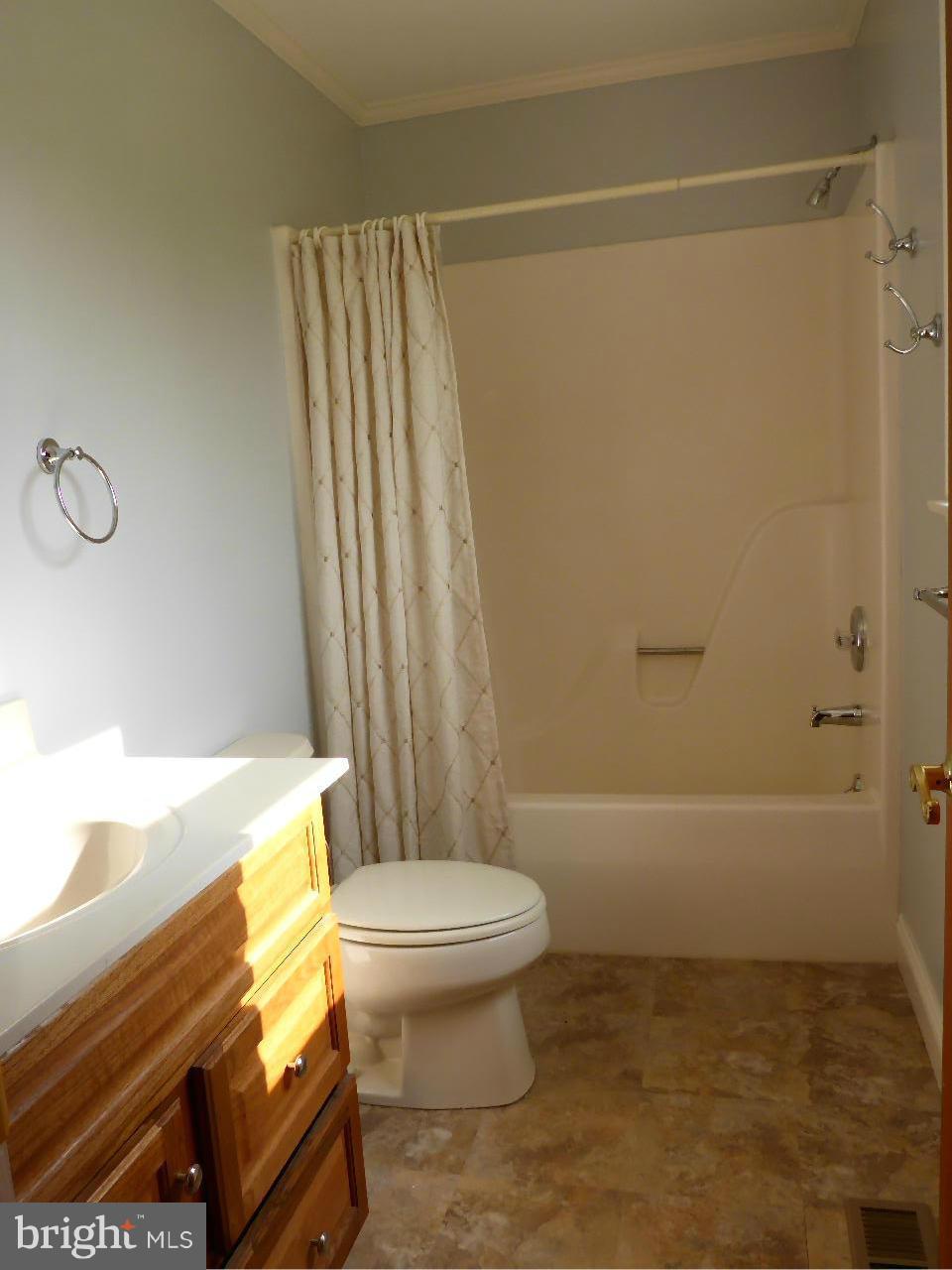 37 Surrey Lane Rising Sun, MD 21911 - Photo 17 of 30 a bathroom with a toilet and a bathtub
