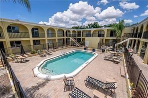 3206 West Azeele Street, Unit 220 Tampa, FL 33609 - Photo 9 of 9 a view of a house with backyard