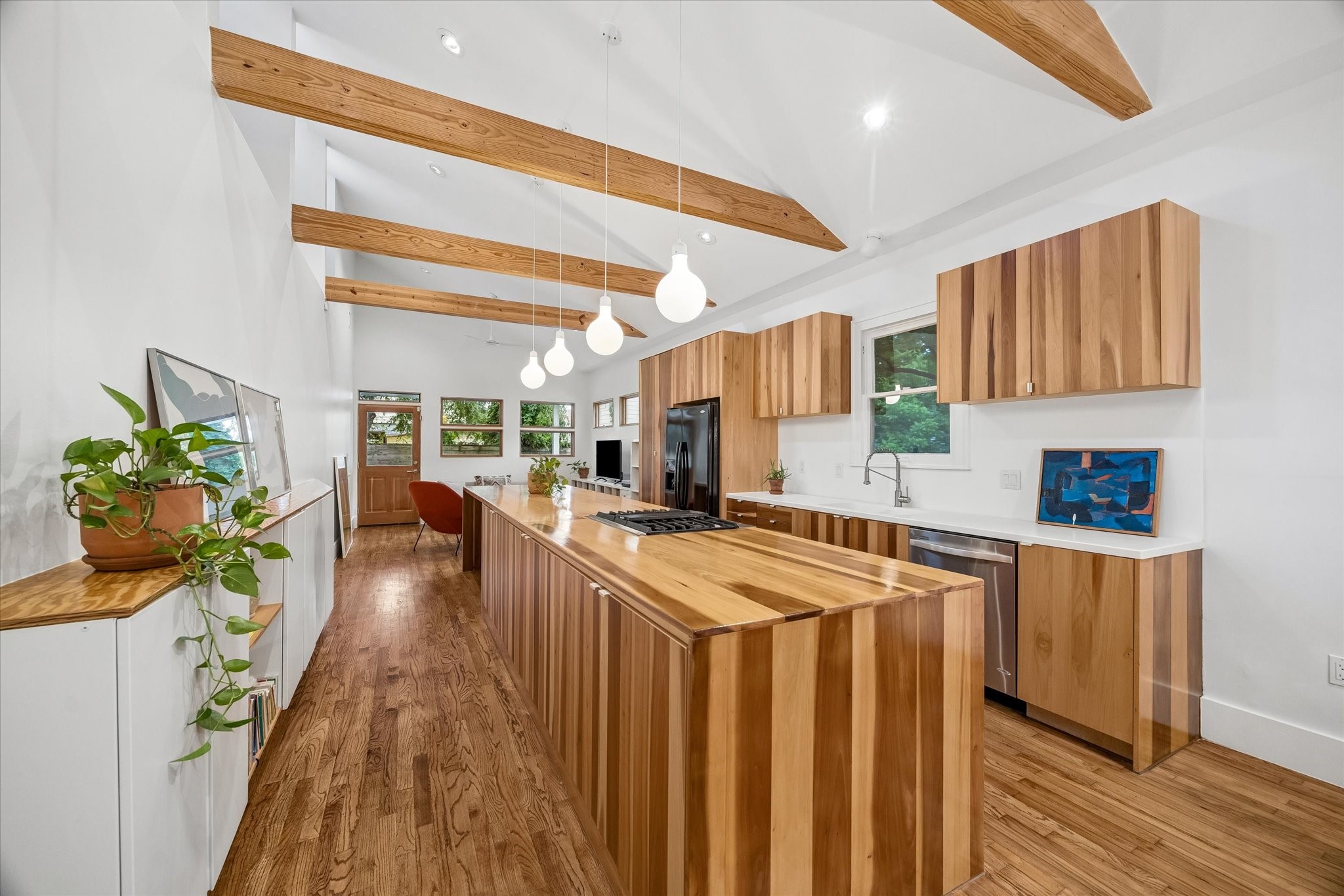 1603 Fulton Street Houston, TX 77009 - Photo 11 of 28 Authentic hardwood flooring throughout, as well as custom wooden cabinets and island countertop.