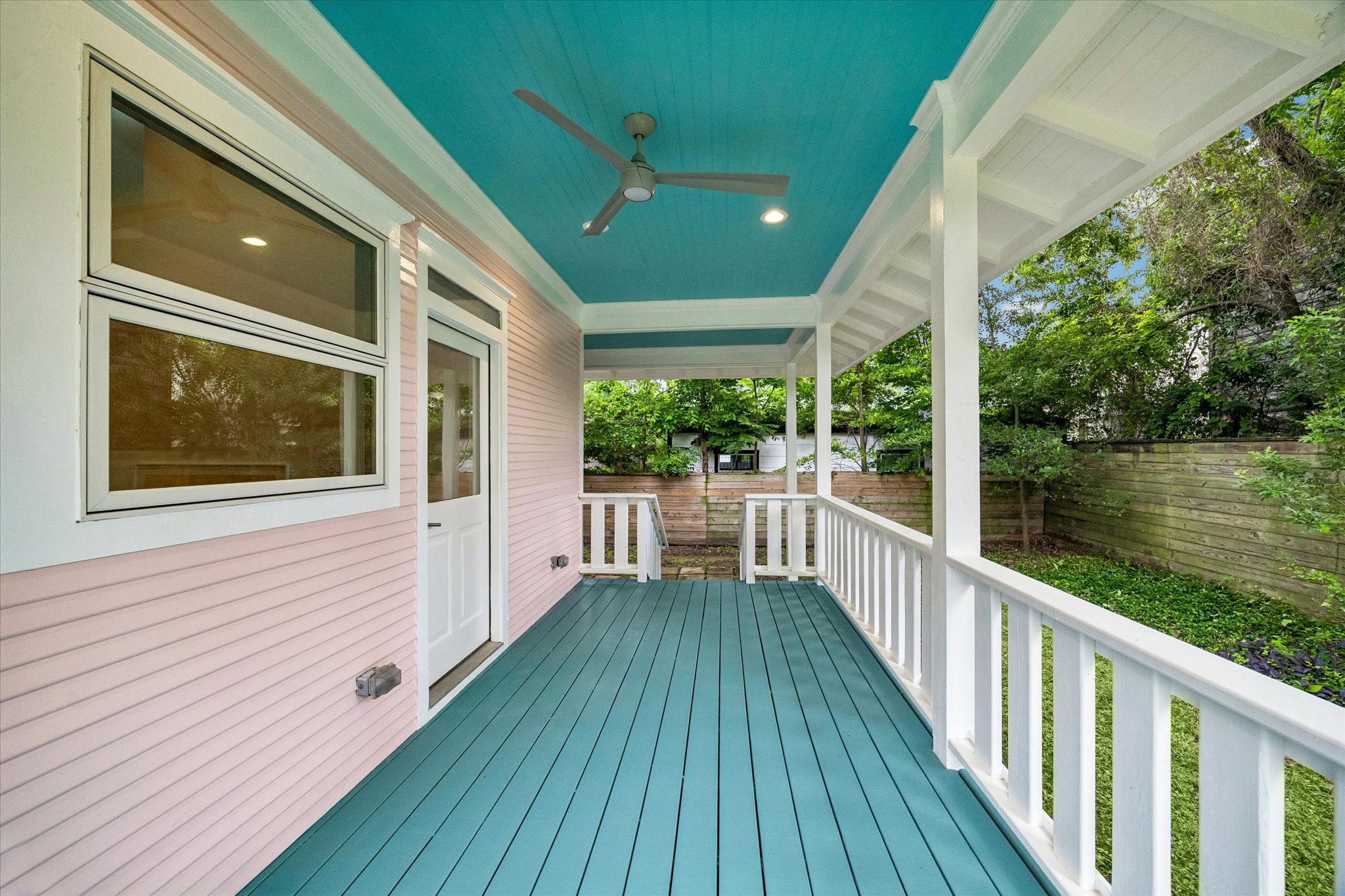1603 Fulton Street Houston, TX 77009 - Photo 26 of 28 High end windows and a custom mahogany door.