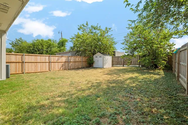 a house with trees in the background