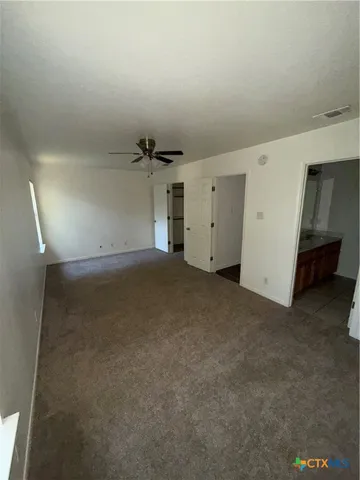 a bathroom with a shower and a tub