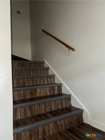 en empty room with windows