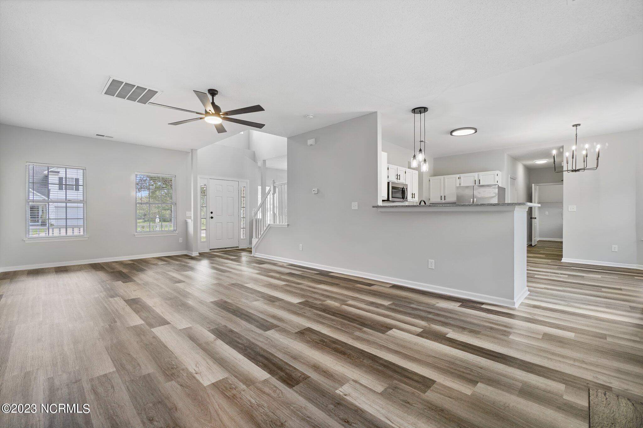 242 Green View Road Moyock, NC 27958 - Photo 10 of 32 living room / open to kitchen