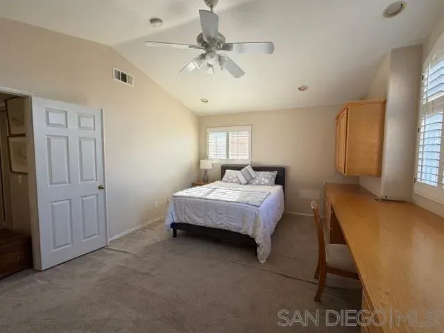 a view of swimming pool with a yard