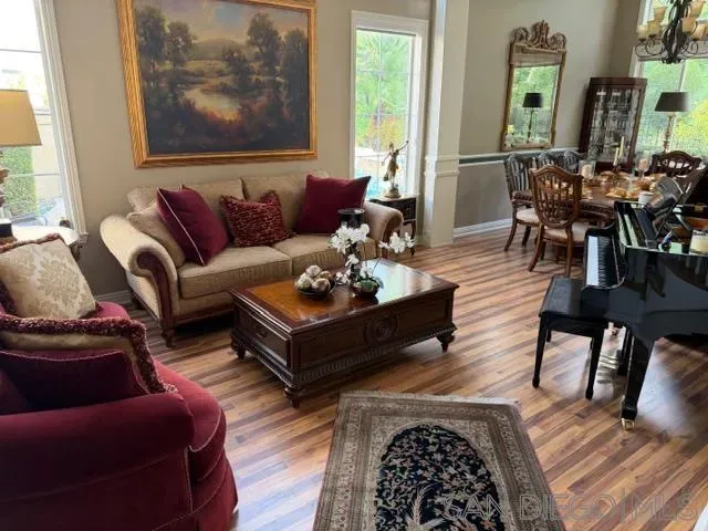 a living room with furniture or couch and a potted plant