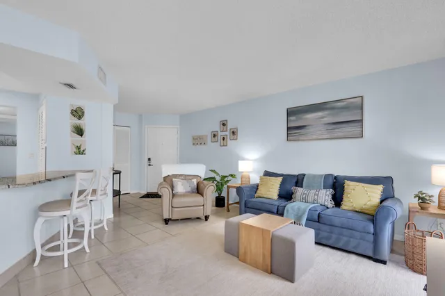 a living room with furniture and a couch