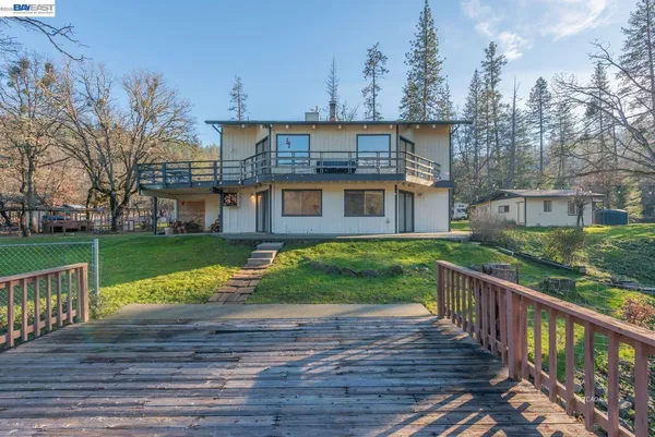 a view of a town with large trees