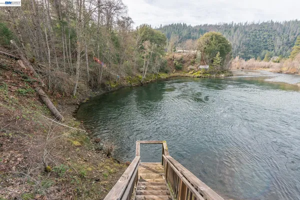 a view of lake with green space