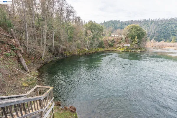 a view of a lake from a balcony