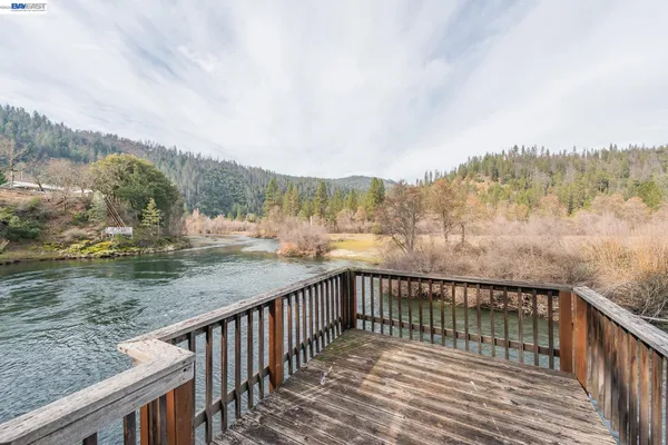 a outdoor living space with furniture and a fireplace