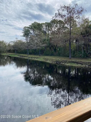 a view of a lake from a yard