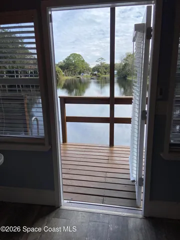 a view of a balcony with a door