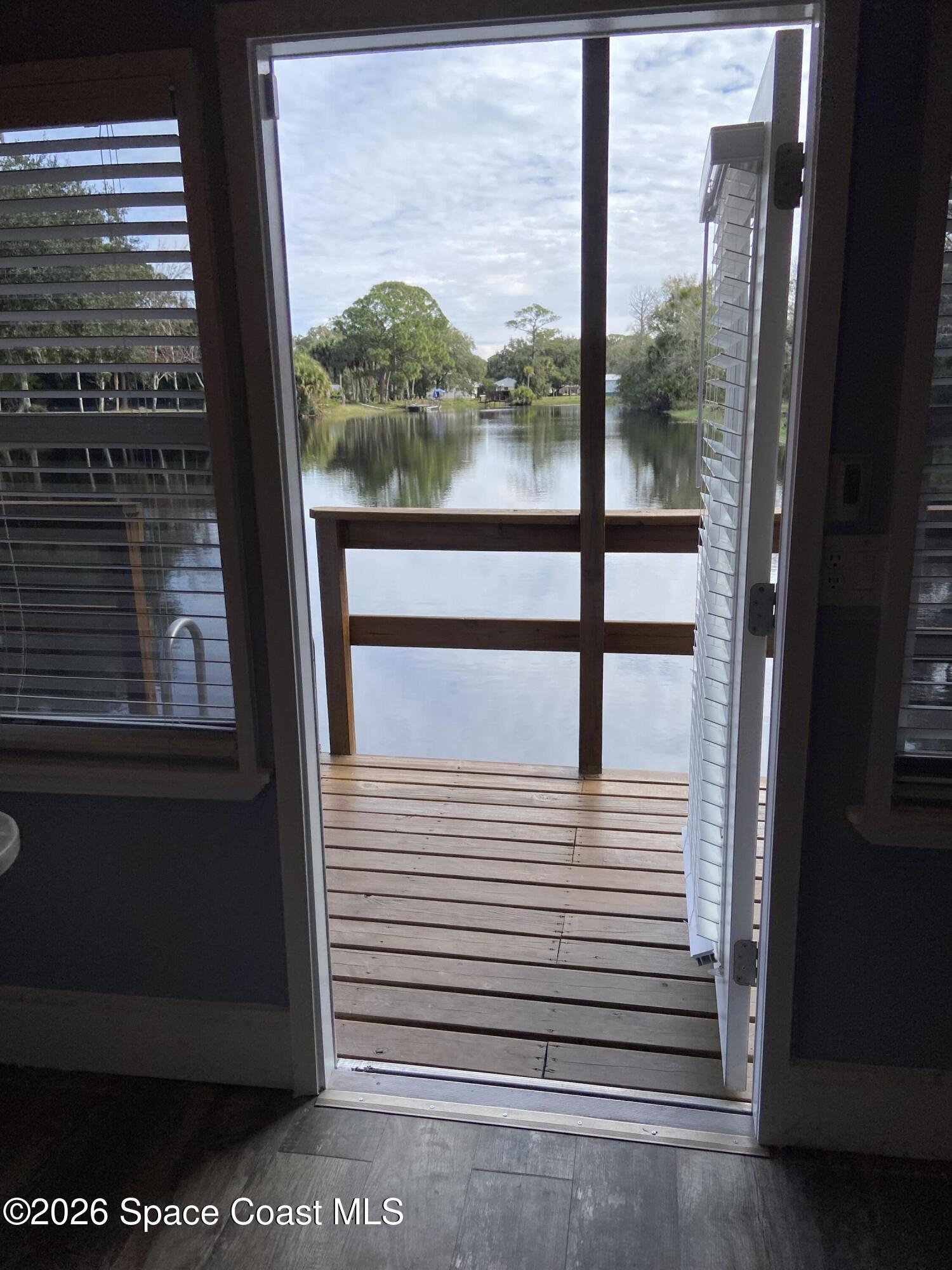 4655 Rector Road Cocoa, FL 32926 - Photo 14 of 47 a view of a balcony with a door