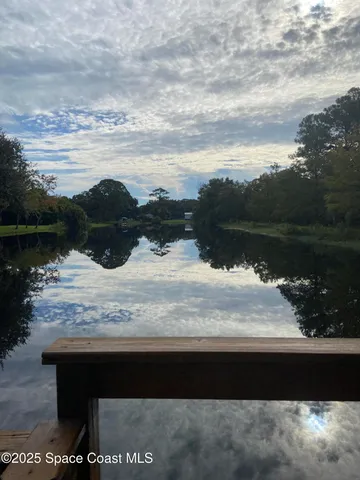 a view of a lake with a mountain