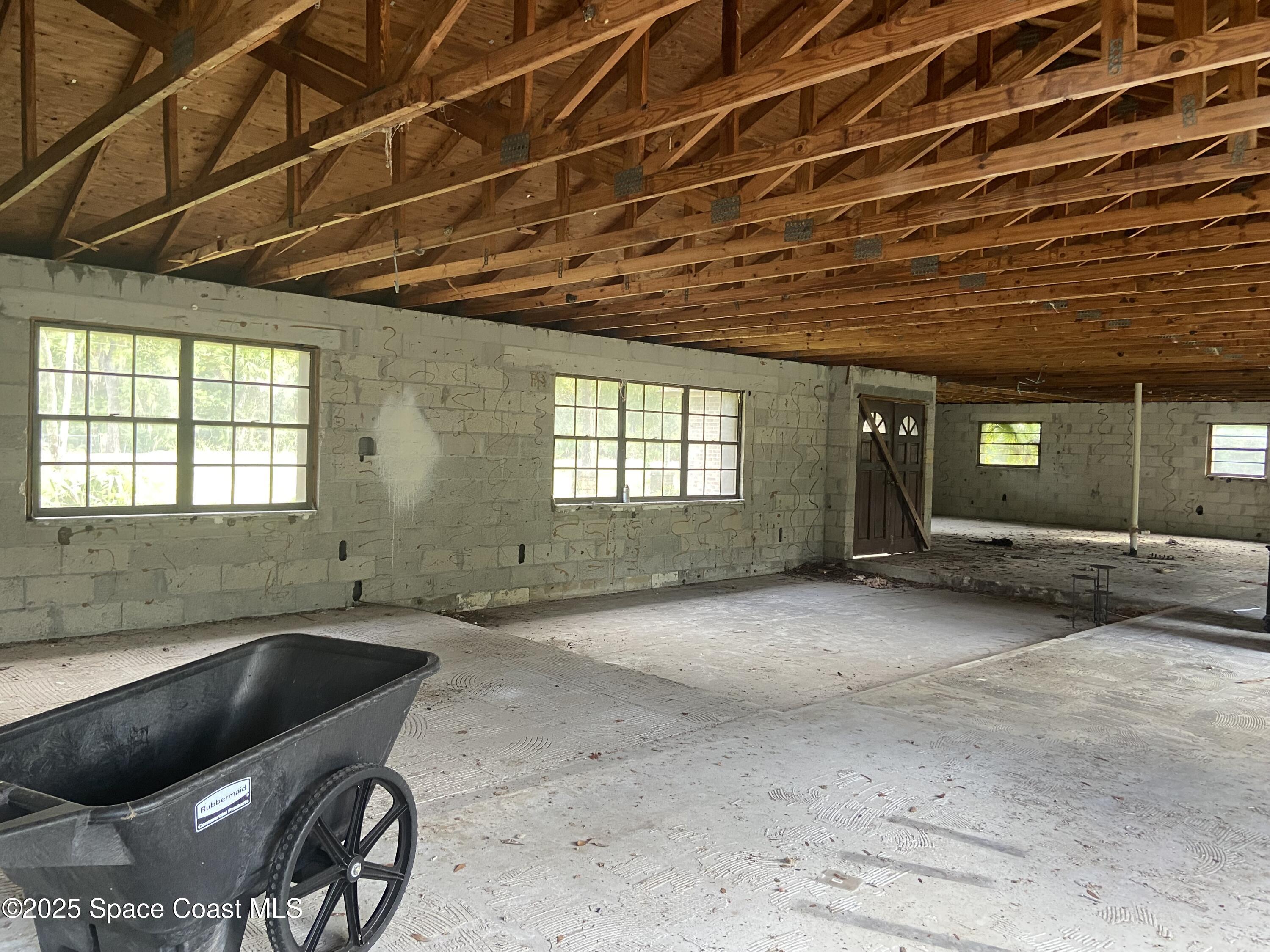4655 Rector Road Cocoa, FL 32926 - Photo 35 of 45 a view of a room with wooden walls and roof