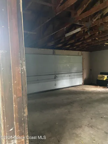 a bathroom with a bathtub and window