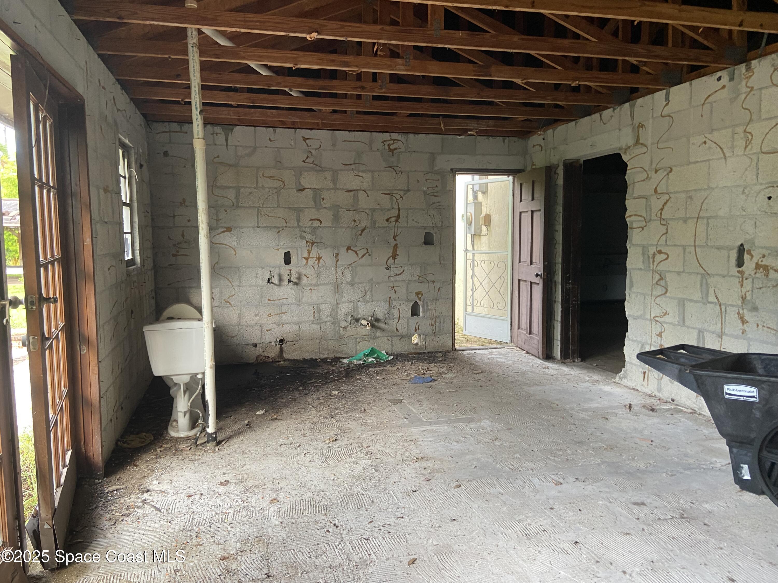 4655 Rector Road Cocoa, FL 32926 - Photo 40 of 47 a view of a patio door and outdoor space