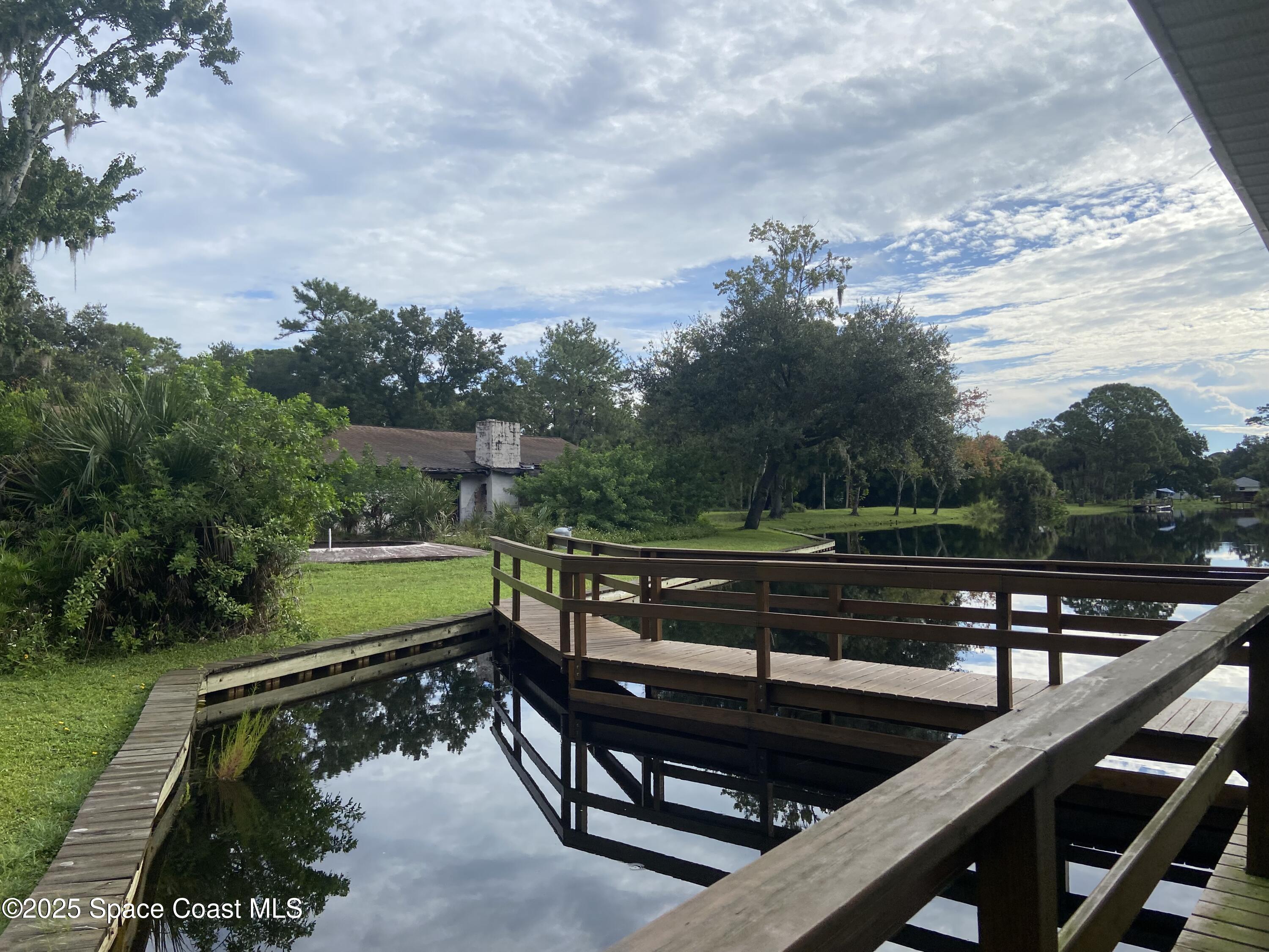 4655 Rector Road Cocoa, FL 32926 - Photo 5 of 47 a view of a bench in the roof deck