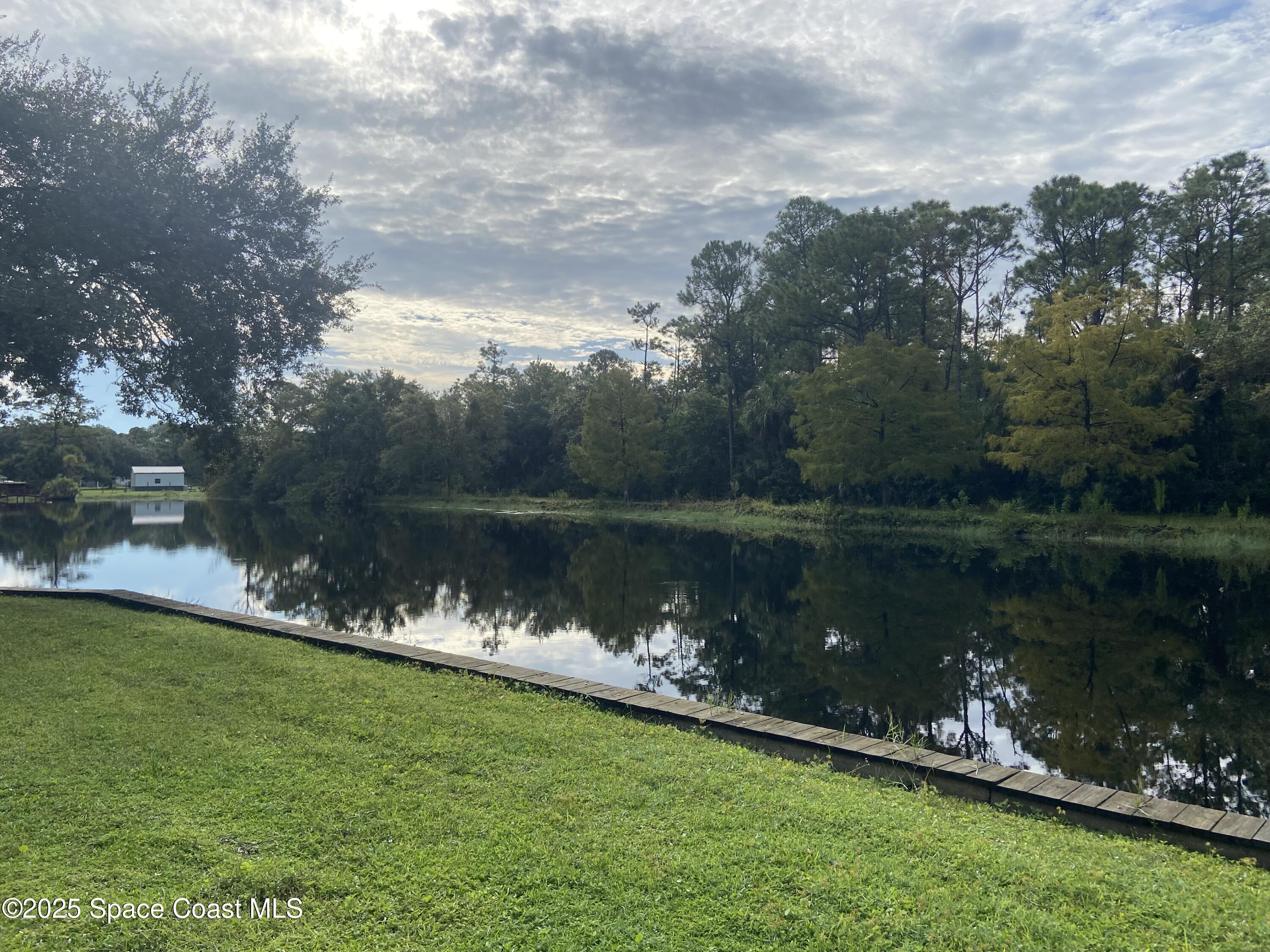4655 Rector Road Cocoa, FL 32926 - Photo 9 of 47 a view of a lake