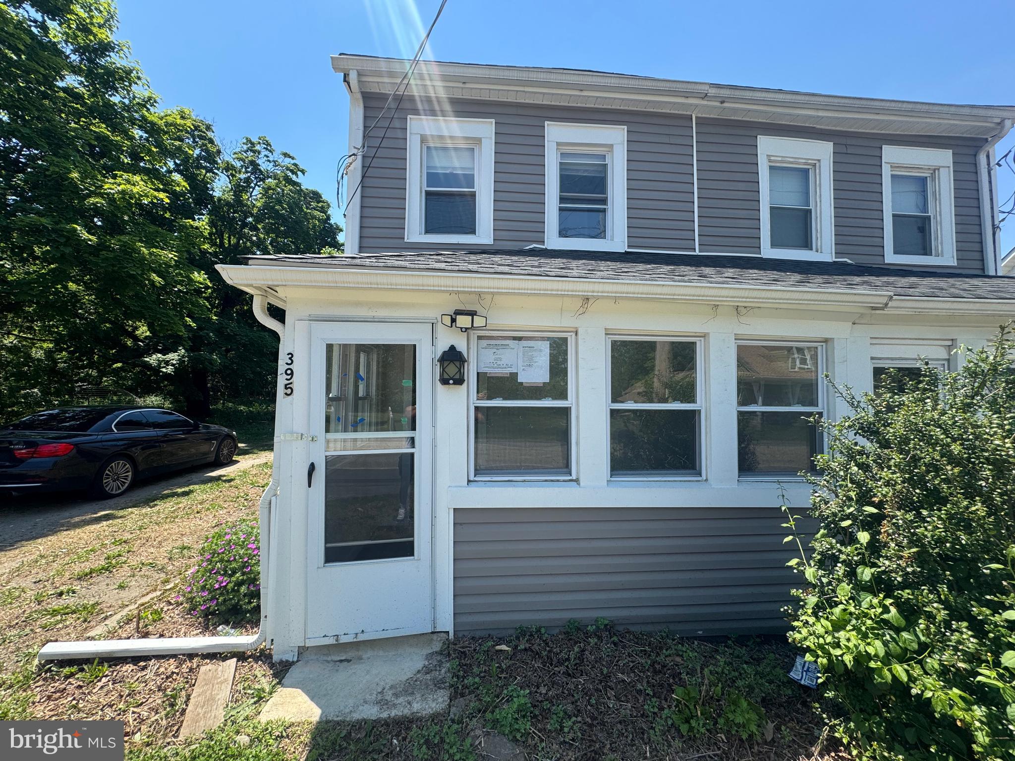 395 Tansboro Road Berlin, NJ 08009 - Photo 1 of 47 a front view of a house with a yard
